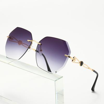 China Metal Rimless Sunglasses 2021 Summer Luxury Metal Gradient Polygonal Oversized Sunglasses Rimless for sale