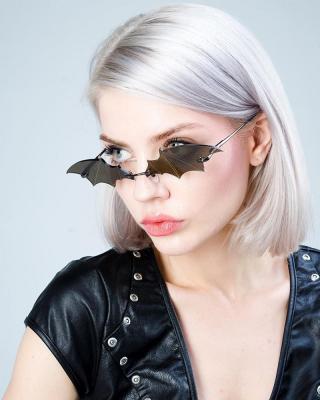 China Lightweight Fashion Metal Eyewear Men Women Rimless Novelty Bat Glasses Sun Wing Shape Sunglasses Unique for sale