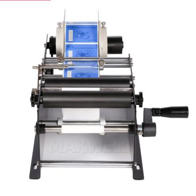 China MAKWELL Manual Food Label Packing Machine Manual Round Plastic Bottle Labeling Machine for sale