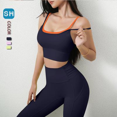 China Two Pieces Breathable Colorful Gathered Shockproof Yoga Bra Pants Yoga Suit Sports And Fitness Suit for sale