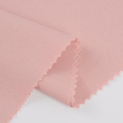 China Super Soft 75d Woven Plain Polyester Stretch Four Way Stretch Fabric For Garment for sale