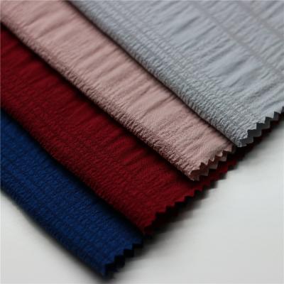 China Shaoxing Polyester Fabric New Design Double Faced Plain Dyed Soft Plaid Four Way Stretch Fabric For Dress for sale