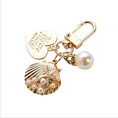 China High Quality Lovely Peach Heart Pearl Dangle Shell Keychain Creative Gift Bag Key Chain Key Ring Trinket Key Accessory Bag Ornament for sale