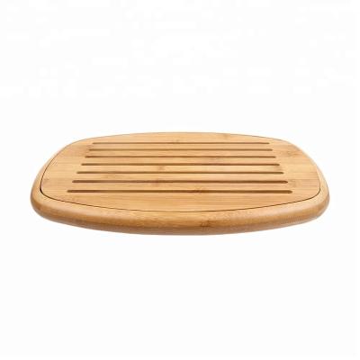 China Sustainable Bamboo Bread Cutting Board With Crumb Catcher for sale