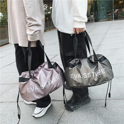 China Fashion new product large capacity travel bag letter printing waterproof hand travel bag sports fitness bag for sale