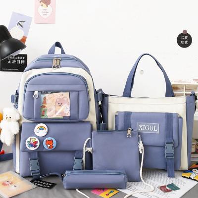 China Cute New Girl Anti-theft Pendant Schoolbag Set Fashion Four Piece Canvas Hit Color School Traverl Backpack Set for sale