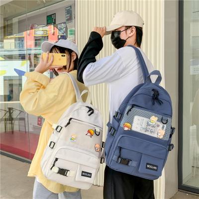 China Large Capacity Waterproof Women Waterproof Soft Travel Strolls Schoolbag Girl Cartoon Decal Pattern Portable Casual Backpack for sale