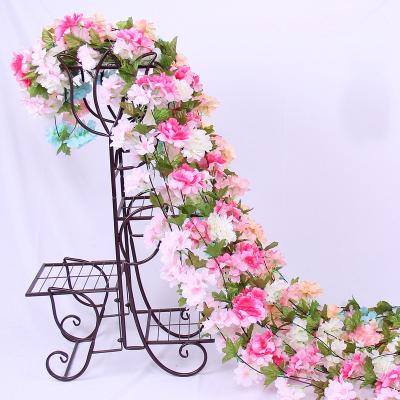 China Rattan Hanging Durable Wedding Garland Wreath Flower Vine Leaf Cherry Blossom Fresh Artificial Flower Plant Decoration Artificial Flower for sale