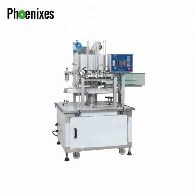 China High Quality Automatic Rotary Beverage Liquid Filling And Sealing Machine for sale