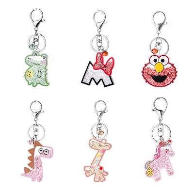 China Cute Cartoon Dinosaur Rhinestone Cartoon Dinosaur Shape Accessories Animal Head Chain Pendant for sale