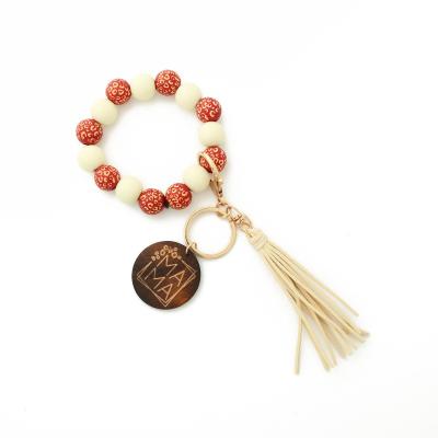 China BOHEMIA Key Chain Silicone Bead Bracelet Wrist Keychains Women Men Fashion Beaded Keychains With Tassel Wholesale for sale