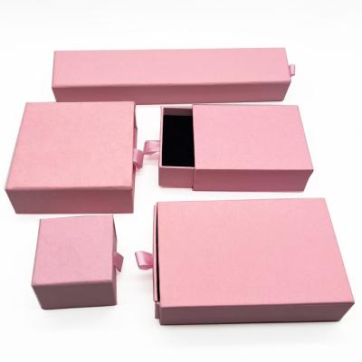 China Custom Sliding Drawer Recyclable Thick Black Whole Set Ring Earring Bracelet Pendant Necklace Gift Boxes Packaging Paper Jewelry Box Set for sale