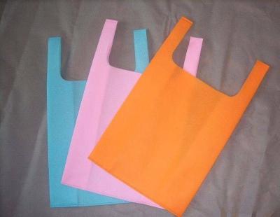 China Gift Bag Customized Vest Shopping Bags Cheap Non Woven T Shirt Bag for sale