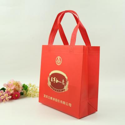 China Gift Bag Customized Logo Nonwoven Foldable Tote Bag Colorful Nonwoven Shopping Bag With Different Size As Your Request for sale