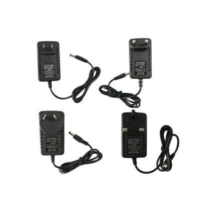 China Constant Current Constant Voltage Factory Price Wall Mount 8.4V 12.6V 16.8V 21V 25.2V 29.4V Lithium Li-Ion Battery Charger 1A 2A Smart Power Plug Adapter for sale