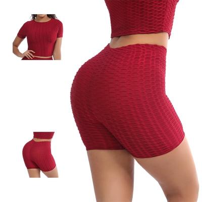 China QUICK DRY Two Piece Set Yoga Clothes Jacquard Fitness Clothes Sports Hip Raise Waist Bubble Yoga Pants Top for sale