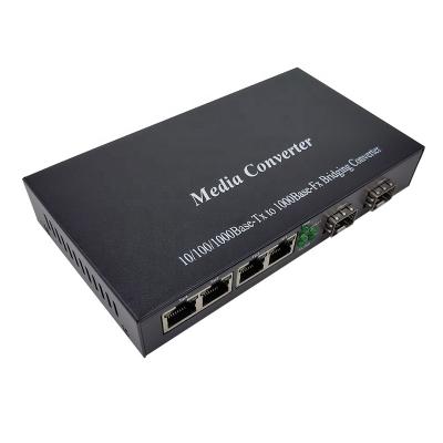 China FTTH FTTB FTTC 4x10/100/1000Base-T RJ45 to 2x1000Base-X SFP Slot Gigabit Ethernet Media Converter for sale