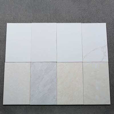 China Anti-pollution manufacture hot sale ceramics wall tile low price 250x400  washroom tiles pure white and  fishbelly white for sale