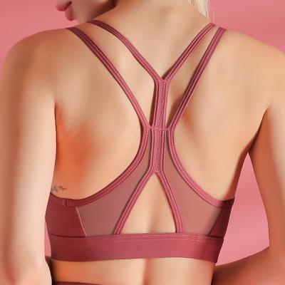 China Antibacterial Shockproof Cross Straps Running Gym Sports Bras Upper Women Widen Edge Lift Up Workout Fitness Yoga Crop Tops Yoga Bra for sale