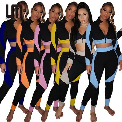 China Breathable Women Tracksuit Ribbed Zipper Crop Top And Pants Skinny Patterned Hot 2 Piece Streetwear Set for sale