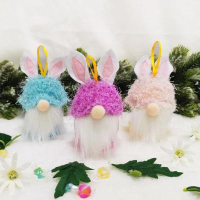 China Rabbit Ear Easter Basket Personalized 2021 New Arrival Easter Decoration Party Gnome Faceless Doll Bunny Ear Candy Jar for sale