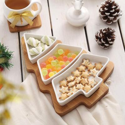 China Sustainable Christmas Tree Shape Design Dessert Serving Set White Porcelain Snack Bowls With Bamboo Base for sale