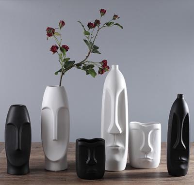 China 2021 Art Decor Human Face Black White Ceramic Flower Vase For Living Room Office Decoration for sale