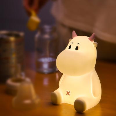 China Cute Rechargeable Ambient Light Silicone Baby Sleeping Cow Lovan U Mini Night Light For Kids for sale