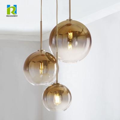 China Modern Simple Creative Modern Post Light Bedroom Luxury Dining Table Dining Lamp Gradient Round Chandelier Glass Lemp for sale