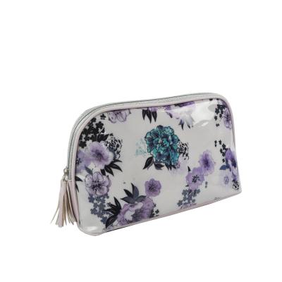 China Wholesale PVC Tassel PVC Cosmetic Bag Makeup Bag Flowers With Logo for sale