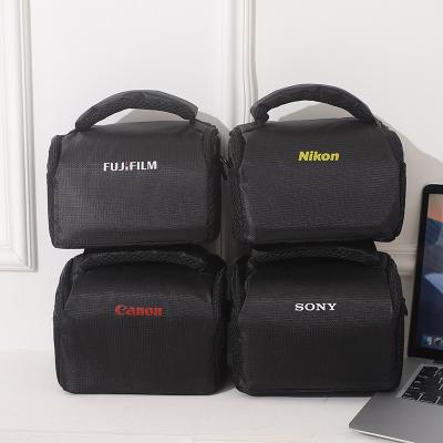 China Waterproof shockproof custom made logo plain small compact universal waterproof shockproof crossbody nylon camera case for dslr for sale