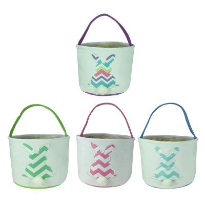 China USA Wholesale Hot Sale Canvas Bunny Tail Easter Basket Canvas Easter Candy Bucket Fluffy Gift For Kids for sale