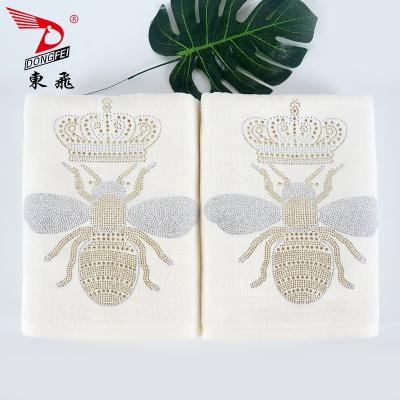 China Bee And Crown Design Diamond Gold Velvet Bath Towel Disposable Soft Light Color for sale