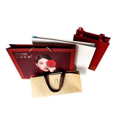 China Recyclable New Fashion Recyclable Gift Paper Bag Paper Bag Custom Print Logo Packaging & Printingogo for sale