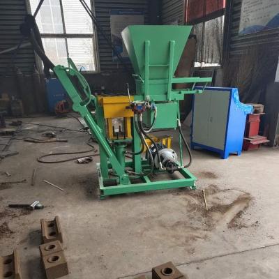 China Manual Hollow Block Maker Building Material Stores Brick Cement Brick Concrete Block Making Machine Price Interlocking Block Making Machine for sale