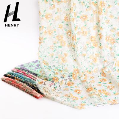 China Viable Factory Manufacturer Customization Beautiful Spring Floral Woven 100% Polyester Printing Lace Fabric For Women Garment for sale