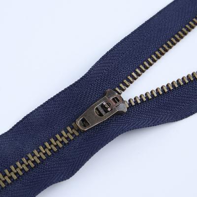 China Viable Hot Selling Brass 3# 4# Y Bronze Teeth Closed Tail Metal Self-Locking Zipper Various Sapphire Blue Black And White Dark Color for sale