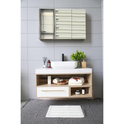 China Modern Wholesale Floating Bathroom Vanity With Sink Bathroom Cabinet Open Shelf Simple White Color for sale