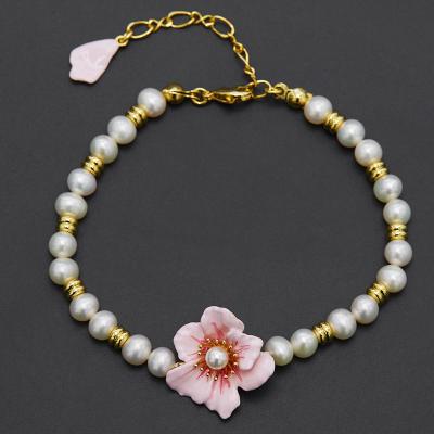 China Vintage natural pearl brass gold plated flowers suitable quality red fashion price guaranteed pink flower pearl bracelet for sale