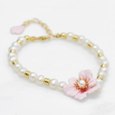 China New FASHIONABLE original design enamel luster pink flowers natural pearl bracelet petal tassel fashion jewelry for girlfriend gifts for sale