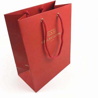 China Recyclable Wholesale Custom Printed Red Matte Kraft Paper Shopping Bags With Rope Handles for sale