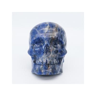 China Home Decoration Super Quality Hand Carved Aura Natural Skull Head Large Clear Sodalite Skulls for sale