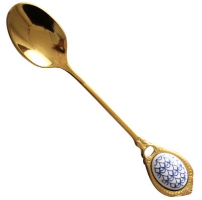 China Home Hotel Restaurant Style Golden Coffee Spoon British Ceramic Handle Stainless Steel Black Tea Afternoon Tea Mixing Spoon for sale