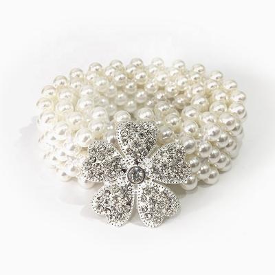 China New Arrival Plastic Fashion Pearl Elastic Flower Beaded Pearl Belts For Women Waist Chain Pearl Body Jewelry for sale