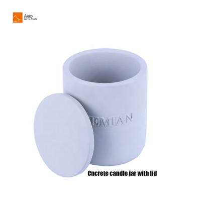 China Fashion/Customized Condition Wholesale Gray Matte Custom Embossed Logo Cylinder Candle Jar Cement Concrete Candlestick With Lid for sale