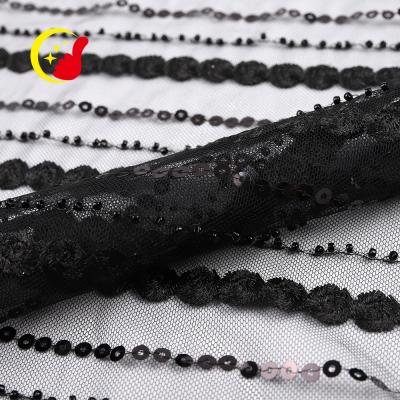 China Viable Custom Design Black Mesh Sequins Hand Embroidery Beaded Fabric Lace For Evening Dress for sale