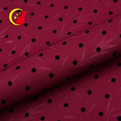 China Antistatic Price Point Design Cheap Dubai Twill Woven Flocked Poly Fabric For Dress Woman for sale