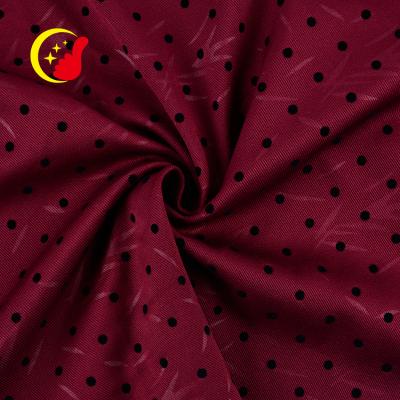 China Antistatic Price Point Design Cheap Dubai Twill Woven Flocked Poly Fabric For Dress Woman for sale