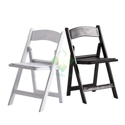 China Traditional Wholesale Outdoor Resin Folding Wedding Chairs for sale