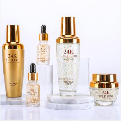 China Anti-wrinkle hyaluronic acid moisturizing and shrinking pore beauty salon essence serum 24k gold set skin care suit for sale